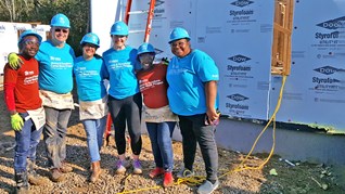 Pinnacle associates at a Habitat for Humanity build.