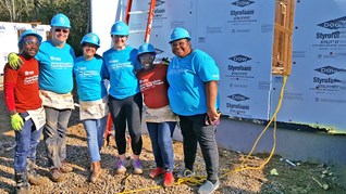 Pinnacle associates at a Habitat for Humanity build.